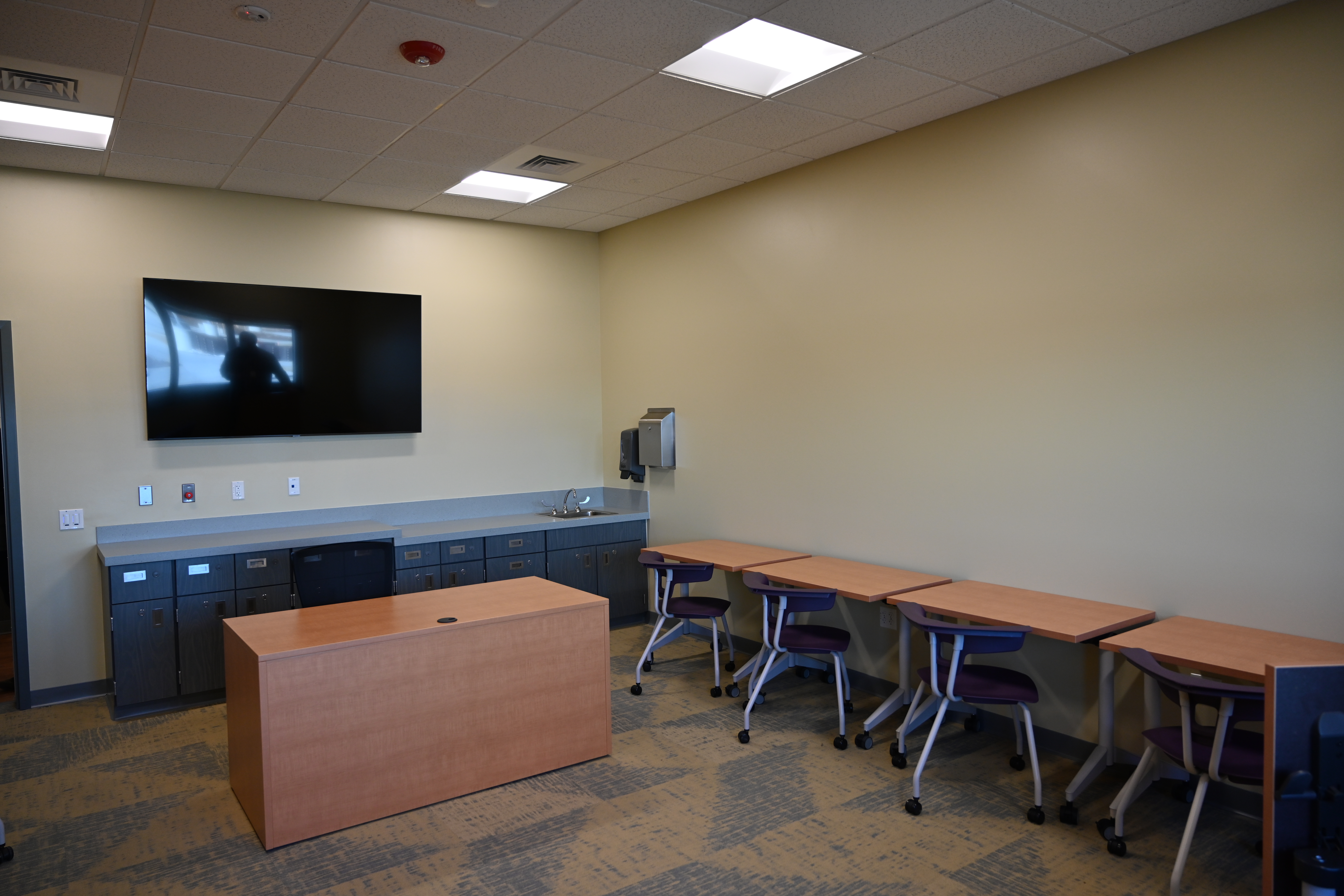 Classroom with desks and chairs and Prairie Vista Youth Services Center