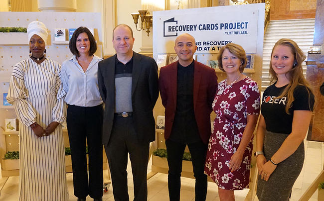 Recovery Cards Project Group Picture with Gov. Polis
