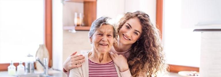 teenage girl with grandmother at home